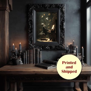 May include: An artwork in a black ornate frame shows a person playing a piano, with books floating in the air. The scene is set in a dimly lit room with candles and books on a wooden table. The text "Printed and Shipped" is on a yellow circle.