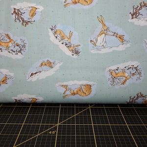 Clothworks. GHMILY 2020. Bunny Scenes Turquoise - Guess How Much I Love You Fabric