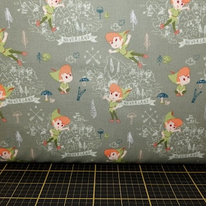 FINAL 12 inches - Camelot Fabrics. Peter Pan & Tinkerbell. Neverland Adventures Green