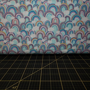Lewis & Irene. Over The Rainbow. All Over Rainbow on Light Turquoise