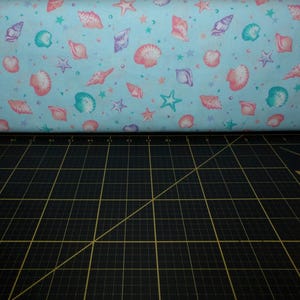 Cosmo Seashells & Starfish Aqua