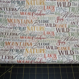 Northcott. Autumn Woods. Multi Color Script Beige