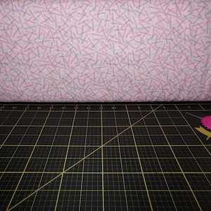QT Fabrics. A Cut Above. Bobby Pins Pink - Beautician and Cosmetologist fabric
