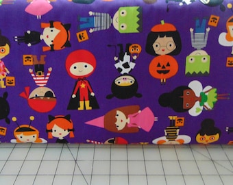 Robert Kaufman. Pumpkin Fun. Kids in Purple - Cute Halloween Kids in Costumes Fabric - Designed by Ann Kelle