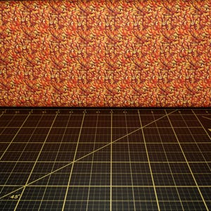 QT Fabrics. Wizards and Warriors. Flame Geo Amber