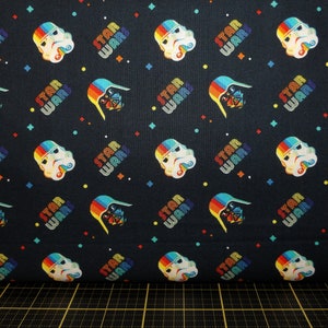 Camelot Fabrics. Star Wars. Rainbow Empire Helms Navy