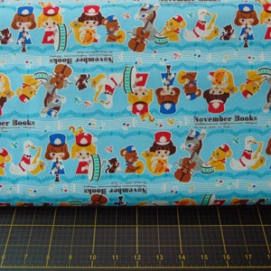 Kokka. November Books Blue - Cotton fabric - Japanese - designed by Push-pin for Kokka Fabrics