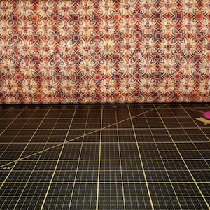 QT Fabrics. Wizards and Warriors. Geo Medallion Brown