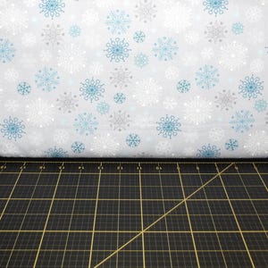 Lewis & Irene. Hygge Glow. Snowflakes on Silver Glow in the Dark