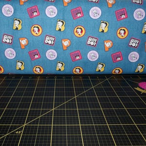 Camelot Fabrics. Betty Boop Collection 3. Boop Denim Patches Blue