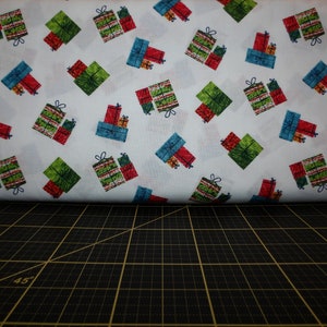 Andover Fabrics. Hungry Caterpillar Christmas. Presents Toss