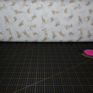 Clothworks. GHMILY 2024. Tossed Bunnies White - Guess How Much I Love You Fabric