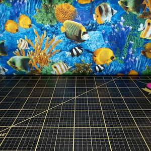 Northcott. Shark Attack. Tropical Fish Dark Blue