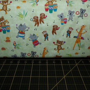 Clothworks. Jungle Drums. Baby Animals Light Lime DIGITALLY PRINTED