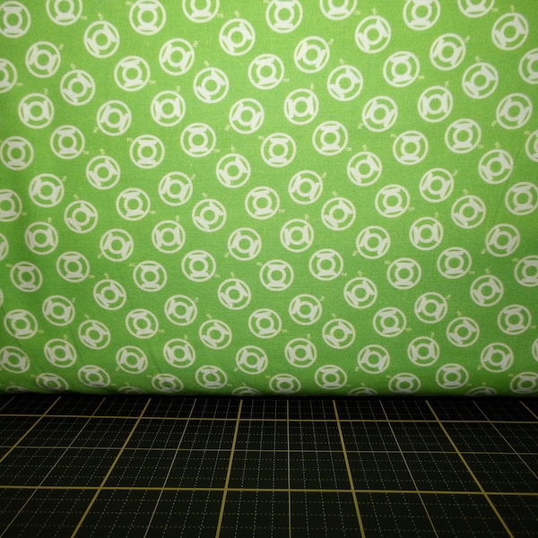 Camelot Fabrics. Green Lantern. Logo Toss Green