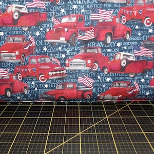 Northcott. Stars & Stripes 11. Trucks Navy Digitally Printed