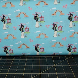 Camelot Fabrics. Disney Heart of a Princess. Mulan Blue