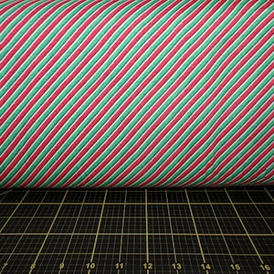 QT Fabrics. Diagonal Stripe Red/Green Double Brushed Poly KNIT