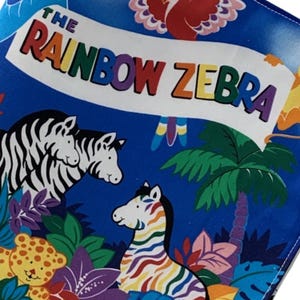 QT-Stoffe. Sew & Go XVI. Regenbogen Zebra Buch Panel Full Yard