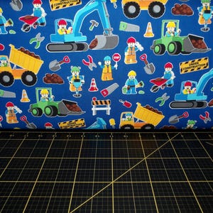 Timeless Treasures. Construction Workers Royal Blue