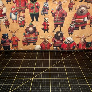 QT Fabrics. Christmas Party Animals. Party Animal Allover Caramel DIGITAL PRINT