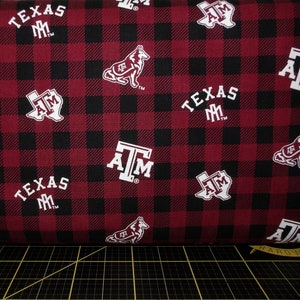 Sykel Enterprises. NCAA Texas A&M Aggies Buffalo Plaid Logo Toss