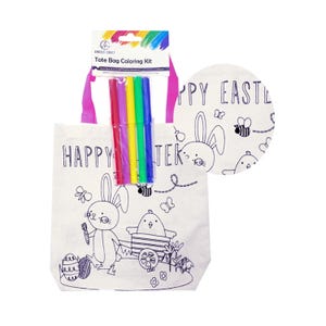 May include: A white tote bag coloring kit with a pink handle. The bag features a black and white illustration of a bunny, a chick, and the text "Happy Easter". The kit includes four colorful markers.