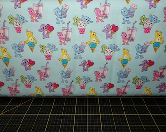 Camelot Fabrics. Care Bears. Sweet Treats Blue