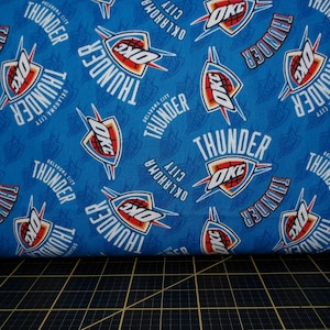 Camelot Fabrics. NBA Oklahoma City Thunder 44/45 - National Basketball Association Oklahoma Basketball Fabric