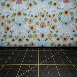 Lewis & Irene. Sunflowers. Bee Hive Pale Blue