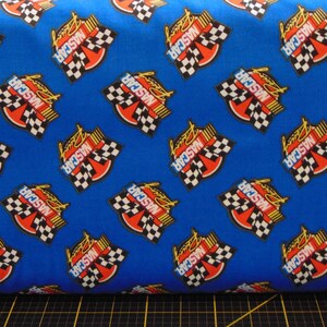 Camelot Fabrics. NASCAR. Retro Racing Blue