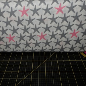 Camelot Fabrics. Beach House. Starfish in Coral. DOUBLE GAUZE 43/44 inches wide