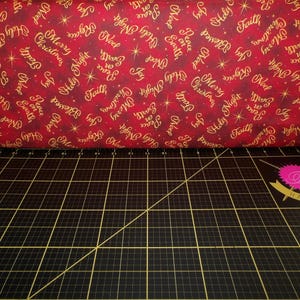 QT Fabrics. A King Is Born. Christmas Words Red DIGITAL PRINT