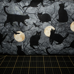 Northcott. Black Cat Capers. Cats Chasing Moon Dark Grey