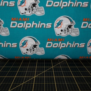 Fabric Traditions. NFL Miami Dolphins Allover 56/58 inches wide