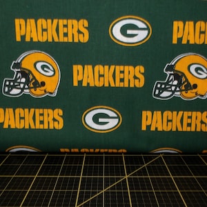 Fabric Traditions. NFL Green Bay Packers Allover Green - 56/58 inches wide