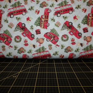 Springs Creative. Red Truck Toss - Christmas Vintage Red Truck Fabric