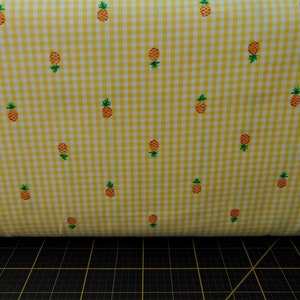 Robert Kaufman. Carolina Shore Prints. Check Yellow Pineapple