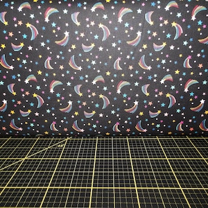 Lewis & Irene. Over The Rainbow. Shooting Rainbow Stars on Nearly Black