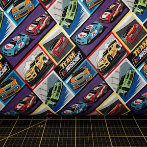 Camelot Fabrics. NASCAR. Racing Blocks Multi