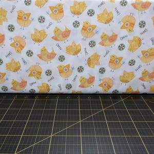 Studio E. Carrot Patch. Pollitos blancos y amarillos - Tela de Pascua