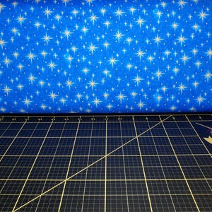 QT Fabrics. A King Is Born. Stars Royal DIGITAL PRINT