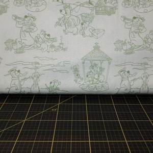 Camelot Fabrics. Yogi Bear. Line Art Scenic Toile Light Green