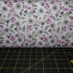Lewis & Irene. Highlands. Bee Thistle on Light Heather - Scottish Thistle Fabric