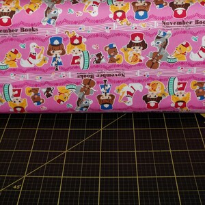 Kokka. November Books Pink - Cotton fabric - Japanese - designed by Push-pin for Kokka Fabrics