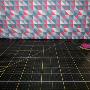 Camelot Fabrics. Pastel Me More. Triangles in Grey