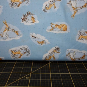 Clothworks. GHMILY 2020. Bunny Scenes Denim - Guess How Much I Love You Fabric