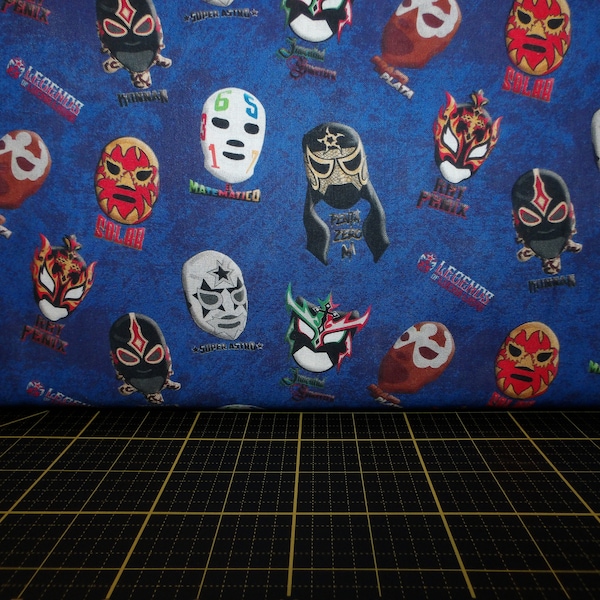 Michael Miller. Legends of Lucha Libre. Tossed Masks Blue - Mexican Wrestlers Fabric