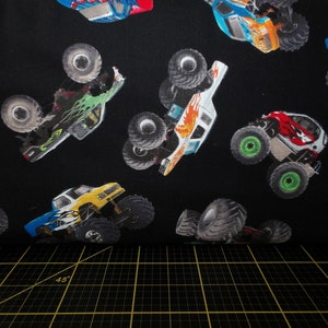 Large Monster Jam Trucks Fire Fabric by Sykel Enterprises - modeS4u