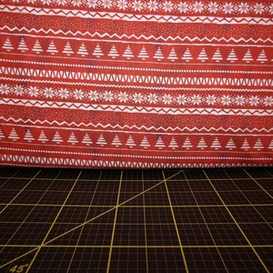 Quilter&#39;s Palette. Christmas Campers. Christmas Sweater Stripe Red - Cotton Fabric that Looks like a Christmas Sweater Stripe